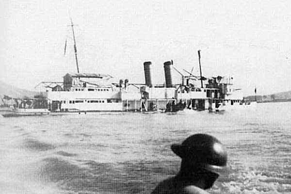 The USS Panay sinking in the Yangtze after being struck by Japanese fighters during the sack of Nanjing.